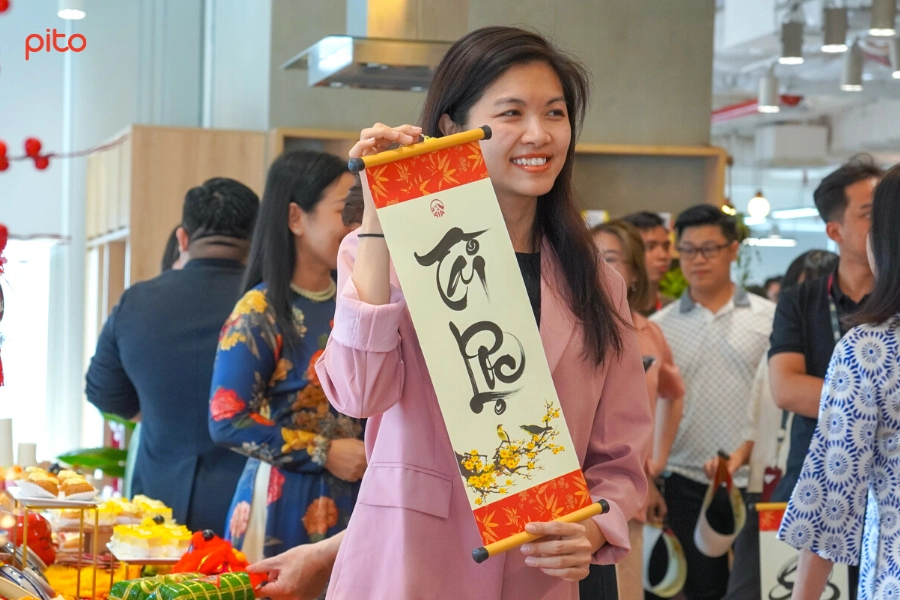 Nhân viên AIA check-in tại tiệc Tân niên - PITO
